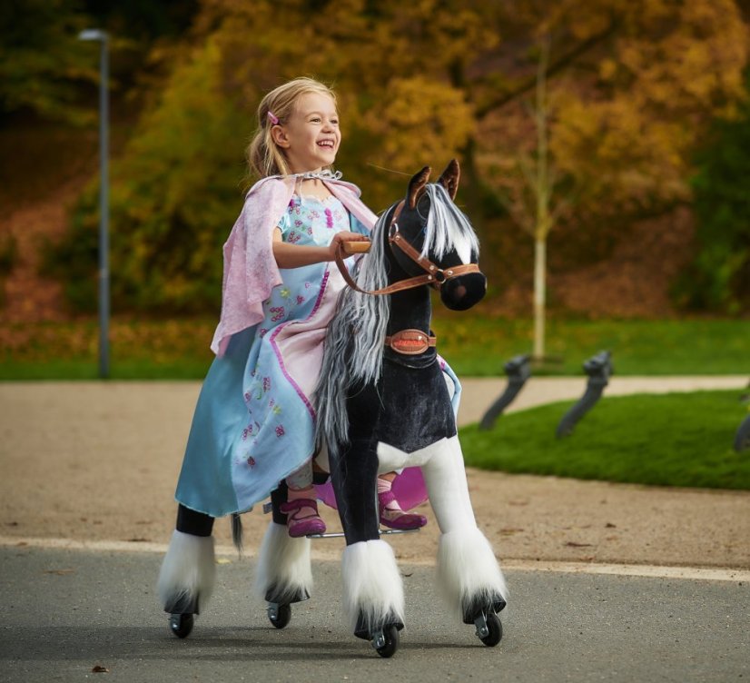 Black-and-white mechanical riding horse Ponnie Domino M | Ponnie