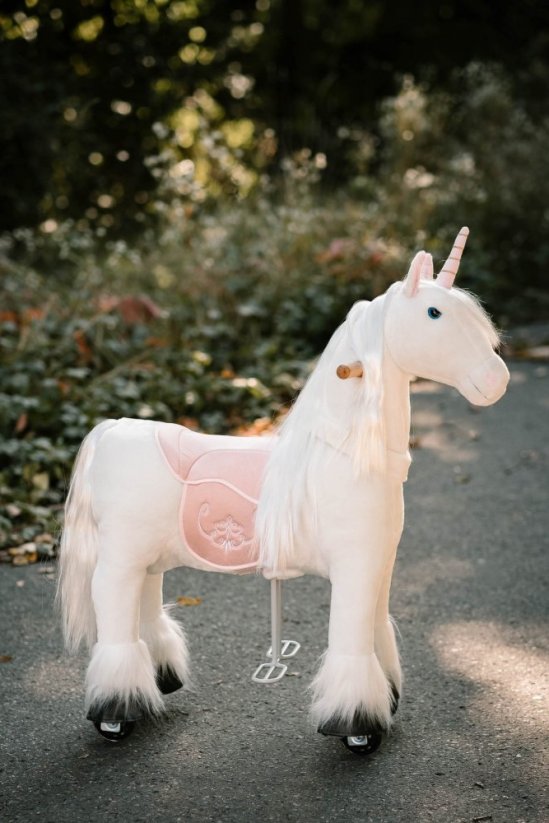 Mechanical riding unicorn Ponnie Merlin S with pink saddle