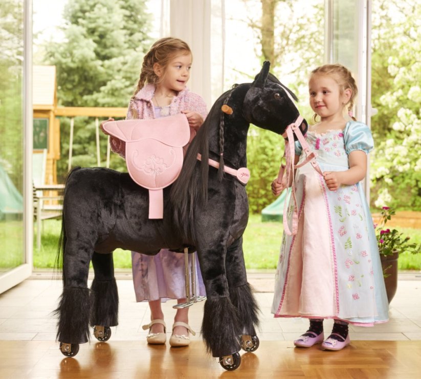 Paard op wieltjes van Ponnie, Ebony, maat M, met roze zadel