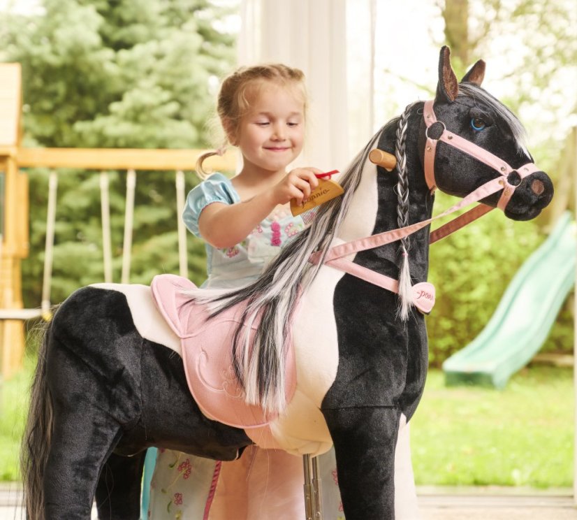 Mekanisk kørende hest Ponnie Domino M med en rosa farvet sadel