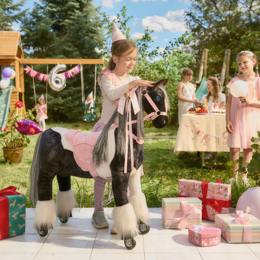 Mekanisk ride on häst Ponnie Domino M med rosa sadel
