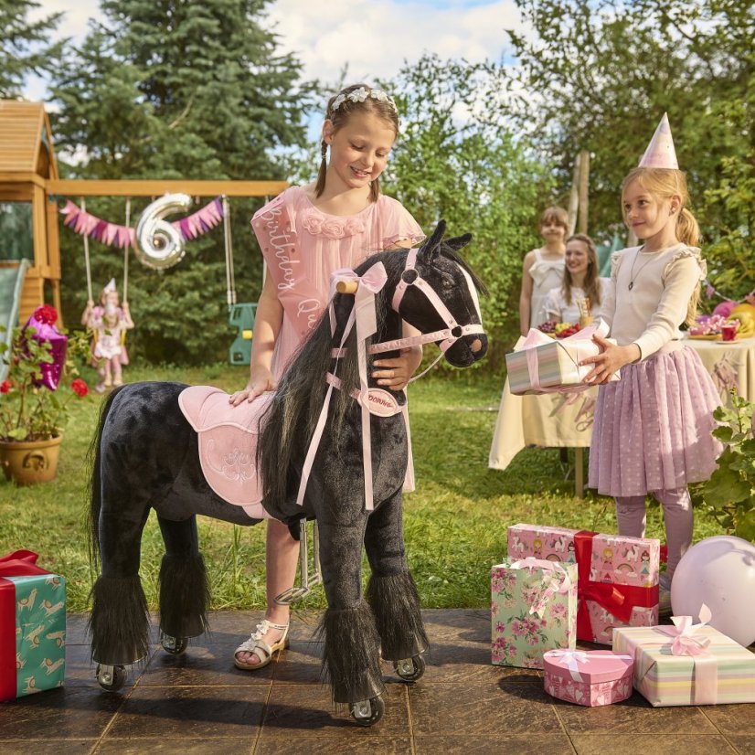 Mechanical riding horse Ponnie Ebony M with pink saddle