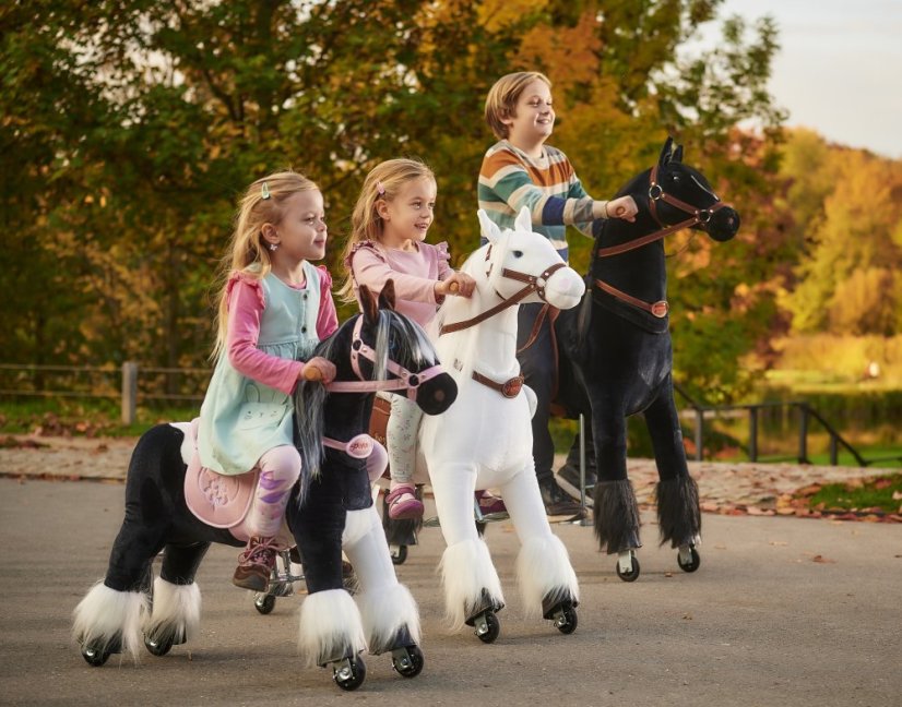 Caballo de montar inline Ponnie Domino S con sillín rosa
