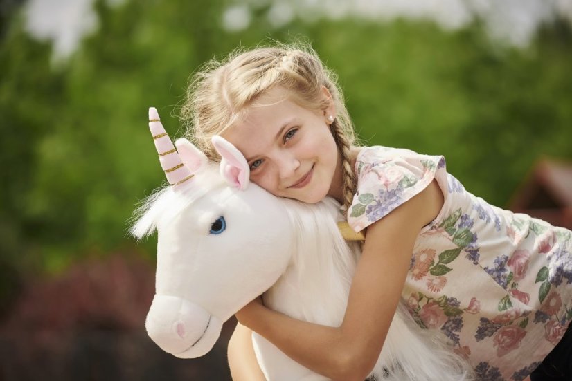 Merlin licorne à roulettes inline Ponnie M une selle rose
