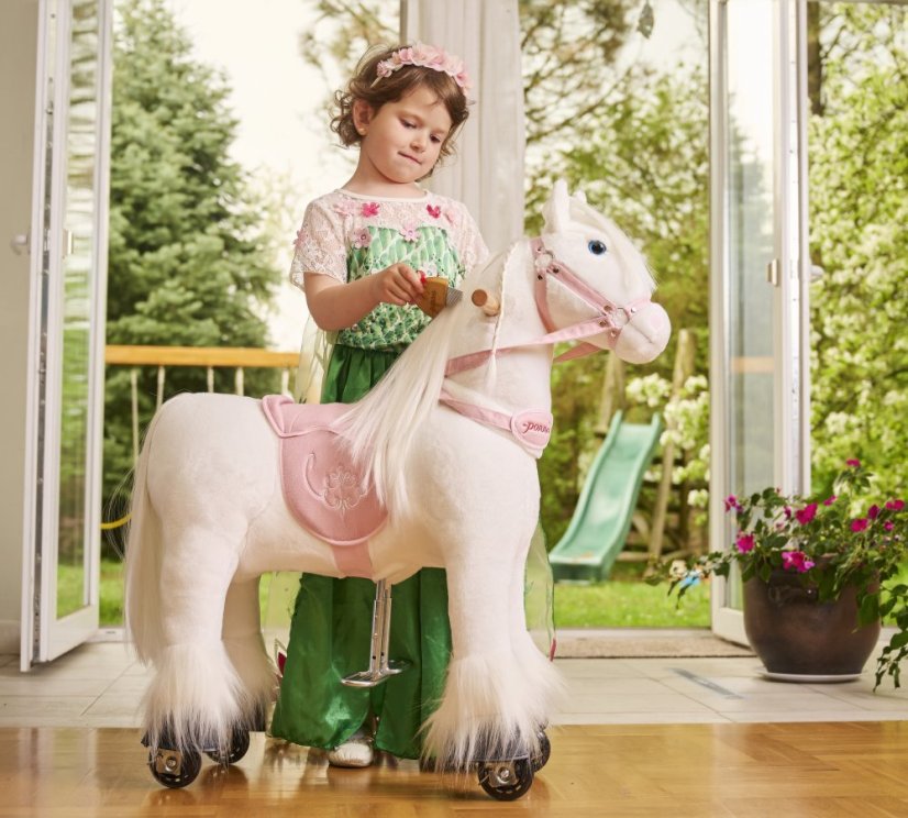 Wit rijdend paard van Ponnie, Tiara, maat S, met roze zadel